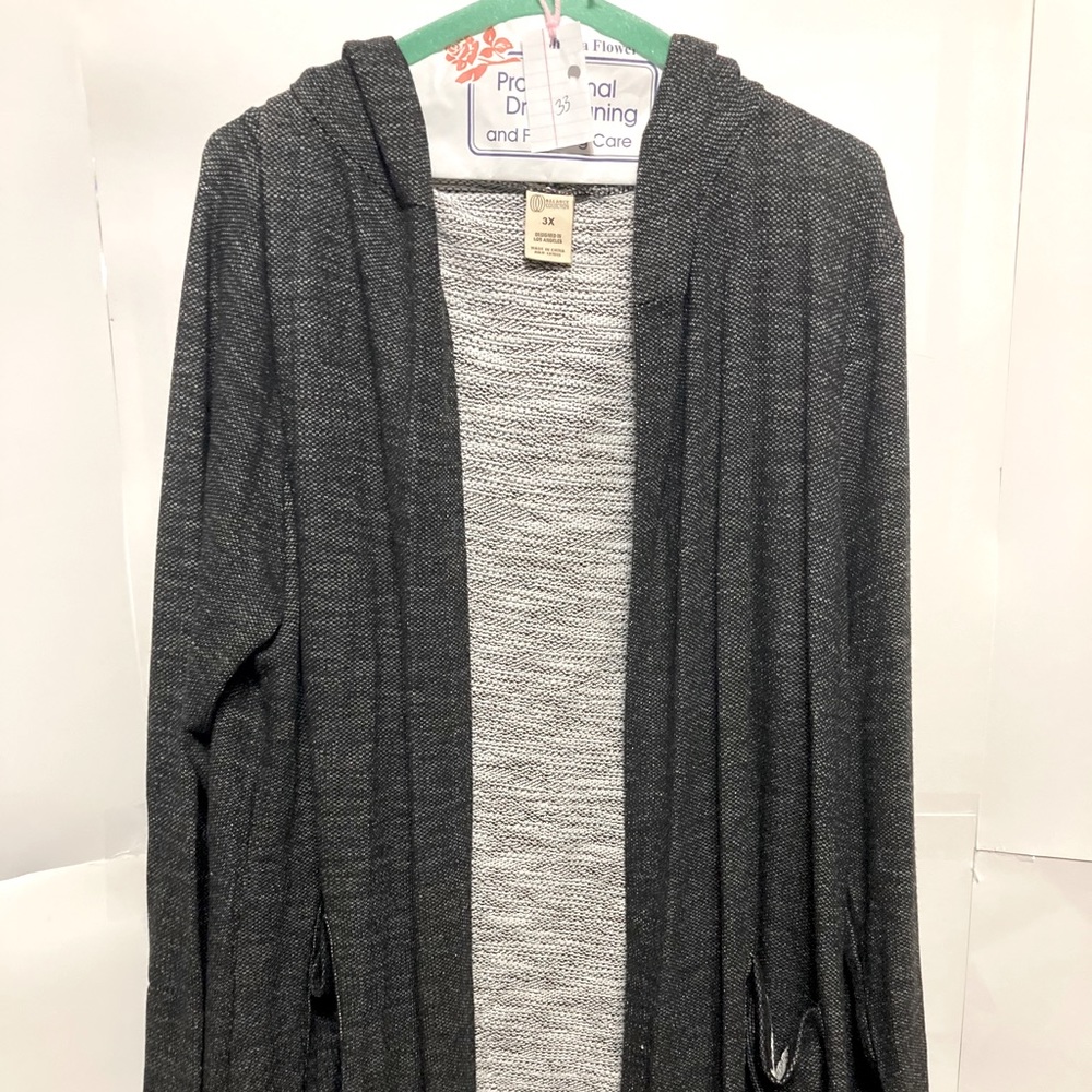 Gray long sleeve hooded sweatshirt with pockets